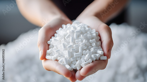 White plastic grain, plastic polymer granules,hand hold Polymer pellets, Raw materials for making water pipes, Plastics from petrochemicals and compound extrusion, resin from plant polyethylene photo