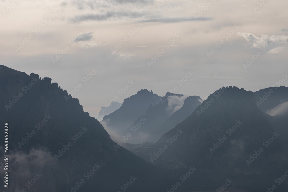 Scenic view of mountains in the clouds