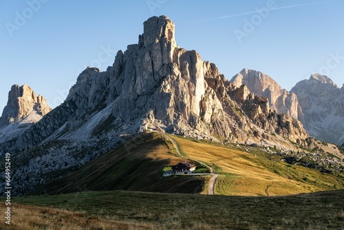 Фотография Scenic view of rocky mountains at golden hour