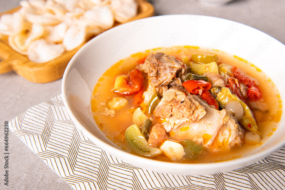 Asem-asem daging iga sapi or beef rib soup with sweet and sour taste. Homemade soup food originates from Central Java but is also famous in East Java, Indonesia Asem-asem daging iga sapi or beef rib soup with sweet and sour taste. Homemade soup food originates from Central Java but is also famous in East Java, Indonesia