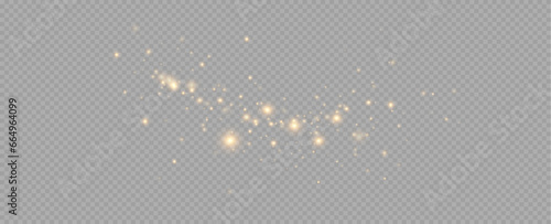 Golden sequins glow with many lights. Glittering dust. Luxurious background of golden particles.	