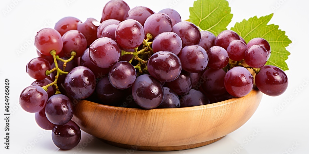 Obraz premium Fresh and Wet Grape Bunches in Wooden Basket