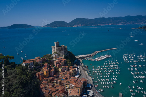 Fototapeta Naklejka Na Ścianę i Meble -  Yachts and boats. Aerial view of Lerici Castle. Italian resorts on the Ligurian coast aerial view. Beautiful aerial view of the coastal Italian city of Lerici.