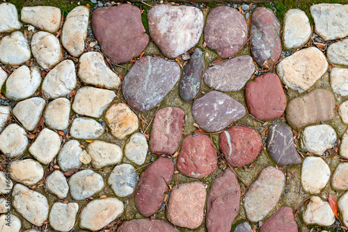 Paving stone pavement texture. Cobblestone pavement top view.