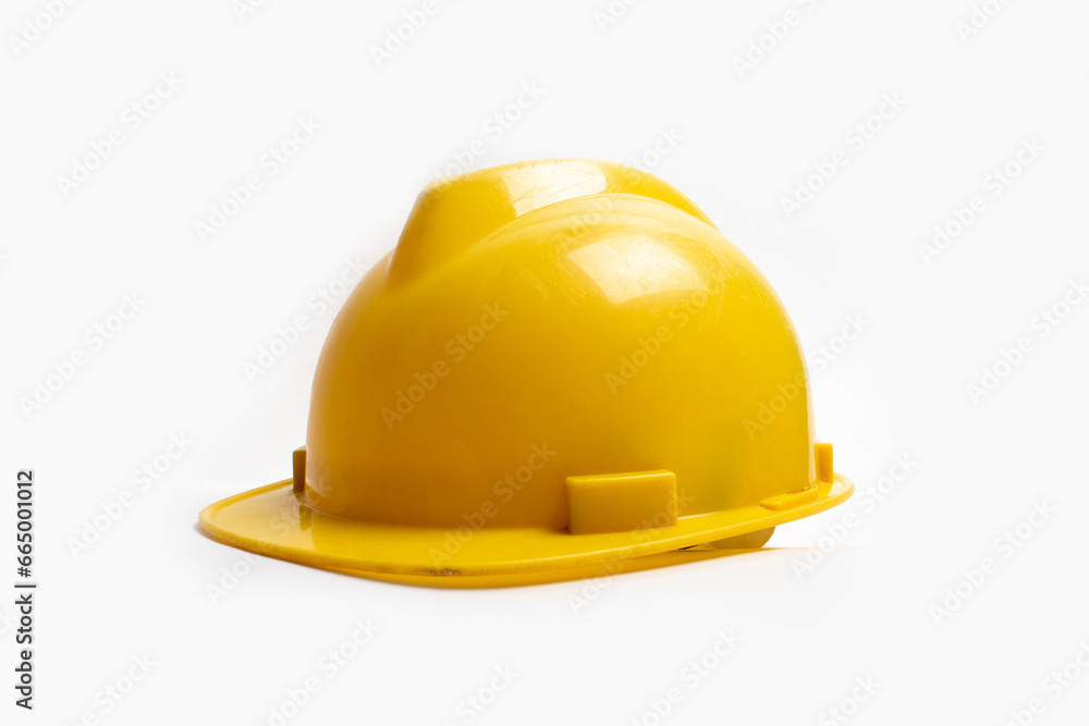 A yellow safety helmet photo isolated on white background A yellow safety helmet photo isolated on white background