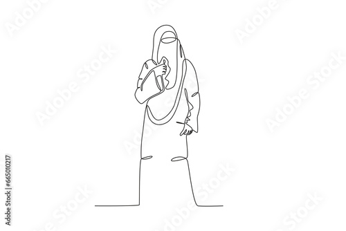 A woman standing wearing a niqab. Niqab one-line drawing