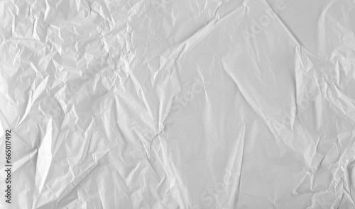 Blank crumpled white thin packing paper background and texture, top view 