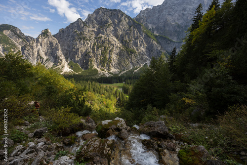 Spring of River Nadiza and famous hiking destination Slemenova peak in Julian Alps in Slovenia photo