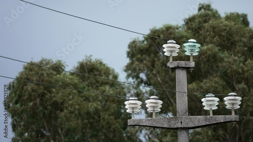 
electricity pole under the stormy wind