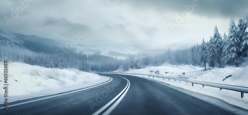 road in cold winter with snowy mountains landscape