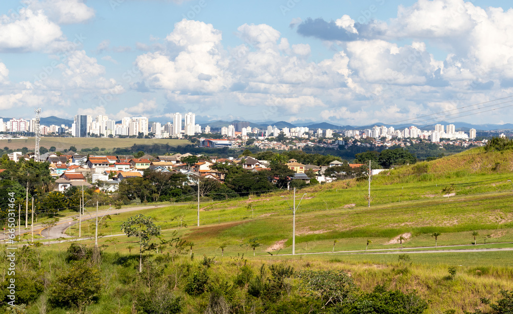 Discover the breathtaking panorama of São José dos Campos, São Paulo. This stunning aerial view captures the city's dynamic urban landscape blending seamlessly with the surrounding natural beauty.