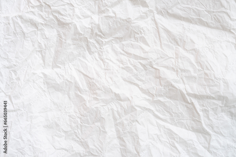 Wrinkled or crumpled white stencil or tissue paper used for crumpled paper background texture. Wrinkled or crumpled white stencil or tissue paper used for crumpled paper background texture.
