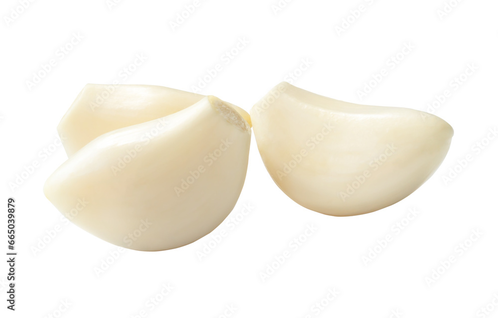 Peeled garlic cloves in stack isolated on white background with ...
