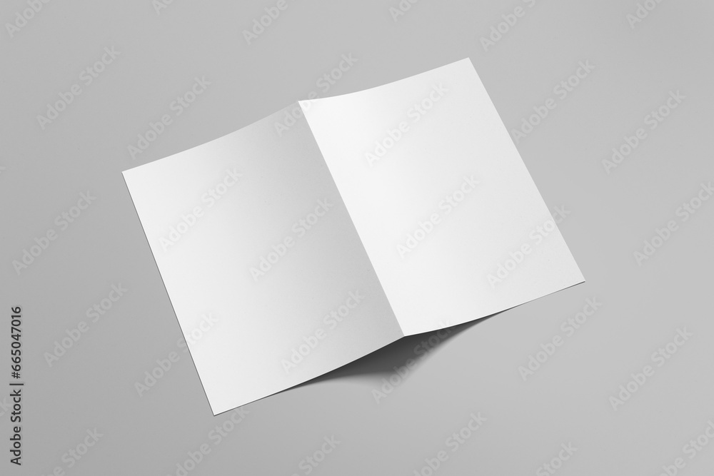 Realistic blank A4 bifold brochure for mockup isolated on gray background Realistic blank A4 bifold brochure for mockup isolated on gray background