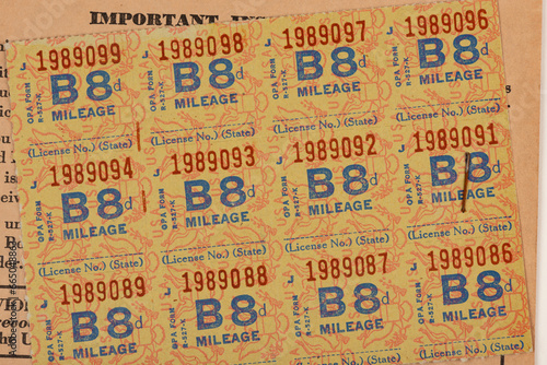 Close up of world war II fuel oil and gas rationing stamps background photo