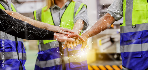Group of civil engineering workers collaborates colleague with fist and field coordination in organization and teamwork : Building network of people in a successful teamwork concept.