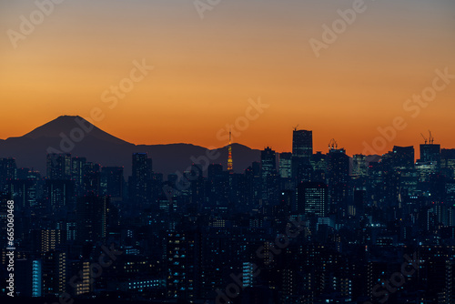 Skyline of mount fuji and A part of Japan tokyo tower in downtown tokyo with sunset