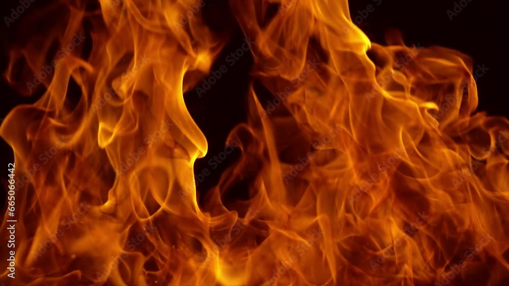 Flames of fire on black background in slow motion Flames of fire on black background in slow motion