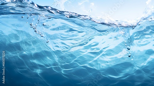 Mesmerizing Dance of Light on Sunlit Gentle Waves in Soft Blue Hues © Philipp