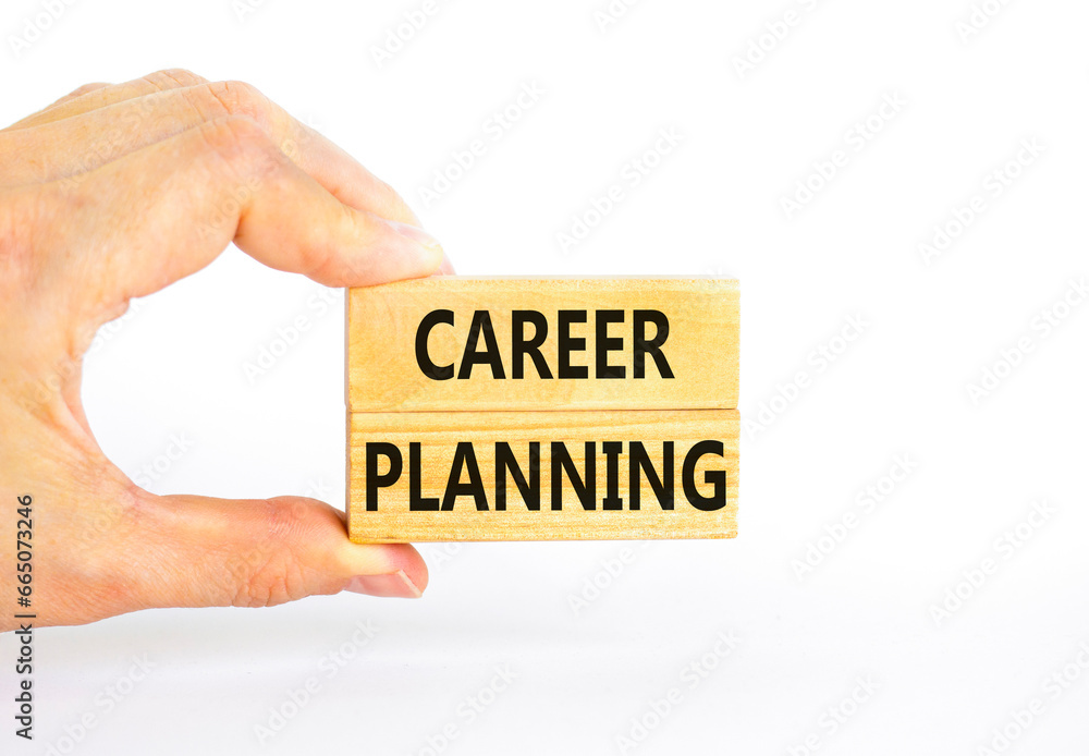 Career planning symbol. Concept words Career planning on beautiful wooden block. Beautiful white table white background. Businessman hand. Business, motivational career planning concept. Copy space. Career planning symbol. Concept words Career planning on beautiful wooden block. Beautiful white table white background. Businessman hand. Business, motivational career planning concept. Copy space.