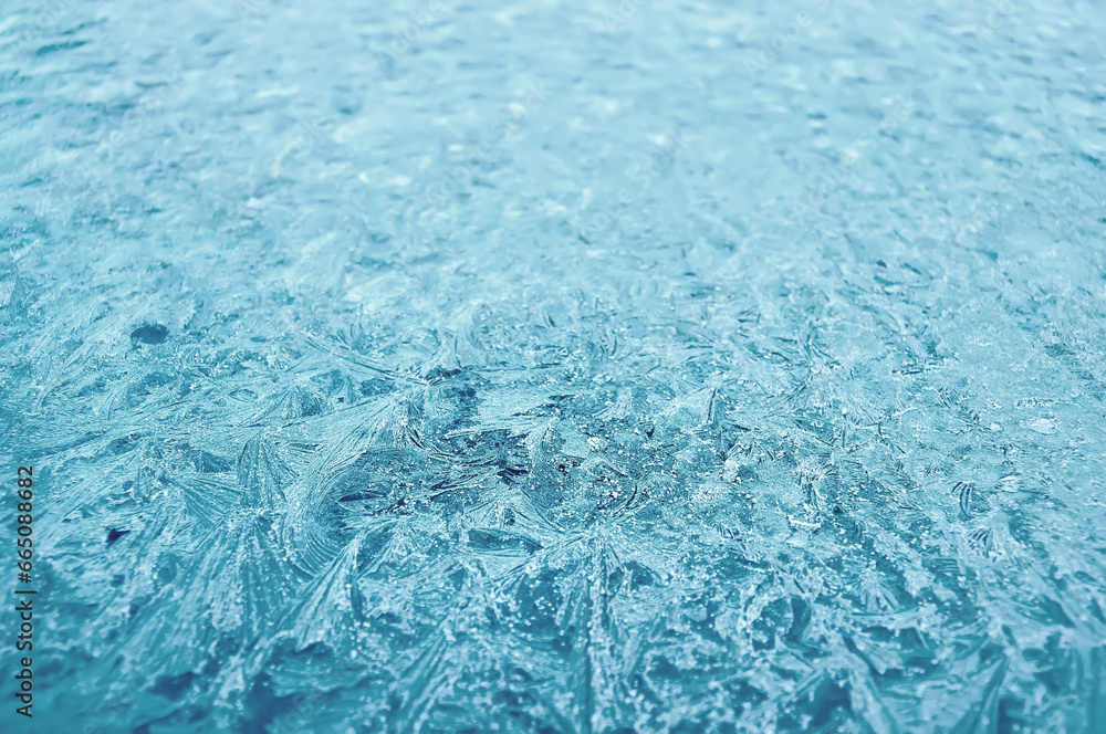 Obraz premium Winter frost patterns on the glass