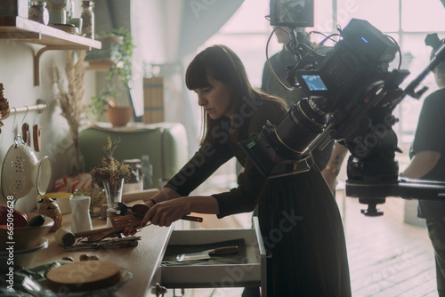 The production designer prepares the scenery on the set. The artist's work in building a frame for filming a movie