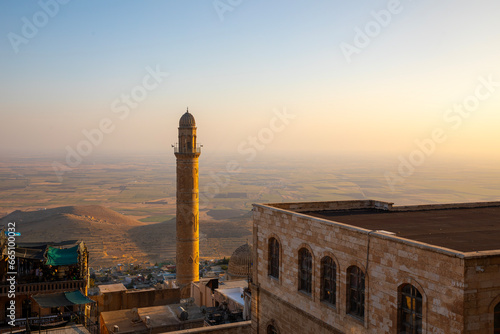 Ancient and stone houses of Old Mardin (Eski Mardin) with Mardin Castle, Located South Eastern of Turkey photo