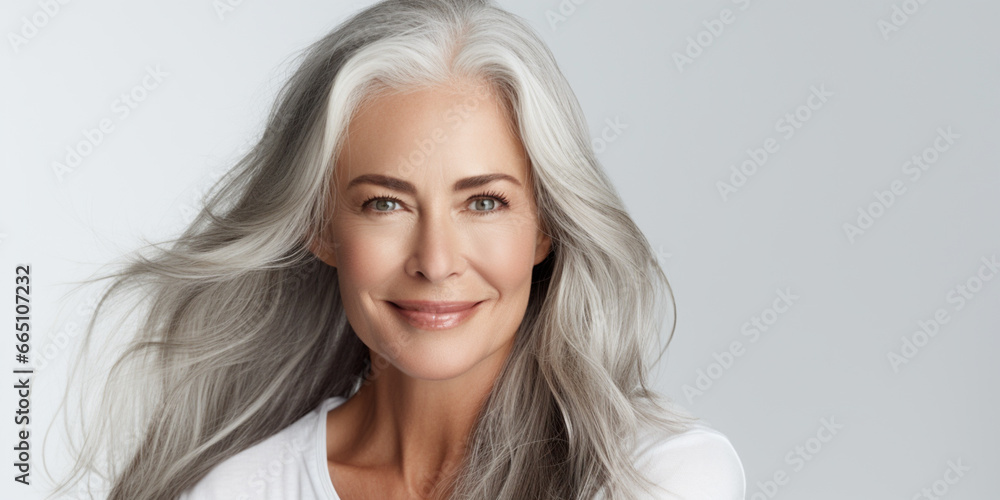 Portrait of Beautiful Older 50s 60s 70s Mid Aged Healthy Mature Woman Isolated on White Background. Anti-aging Skin Care Beauty, Cosmetics Concept. Natural Beauty Product. Portrait of Beautiful Older 50s 60s 70s Mid Aged Healthy Mature Woman Isolated on White Background. Anti-aging Skin Care Beauty, Cosmetics Concept. Natural Beauty Product.