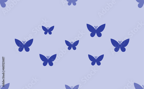 Seamless pattern of large isolated blue butterfly symbols. The pattern is divided by a line of elements of lighter tones. Vector illustration on light blue background