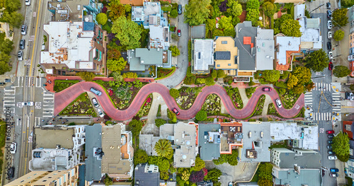 Aerial straight down view Lombard Street with cars driving down red brick road