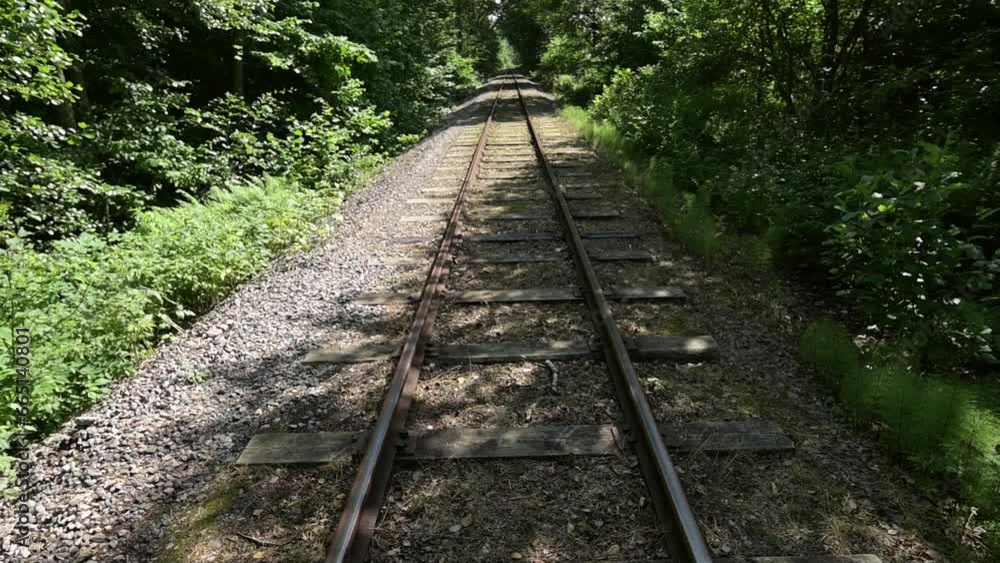 Slowly decending down on a straight railway track Slowly decending down on a straight railway track