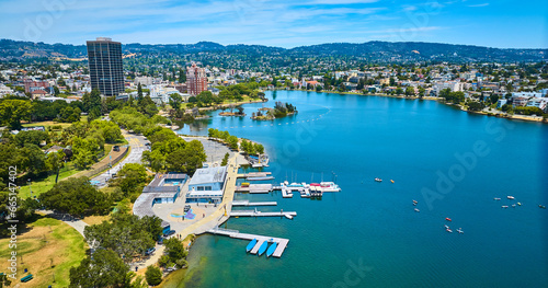 Aerial Lake Merritt Boating Center with Pelican Island in distance with buildings along shore