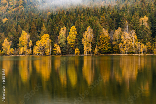 Obraz na płótnie reflections with forest in autumn lake, Sf Ana lake w salonie