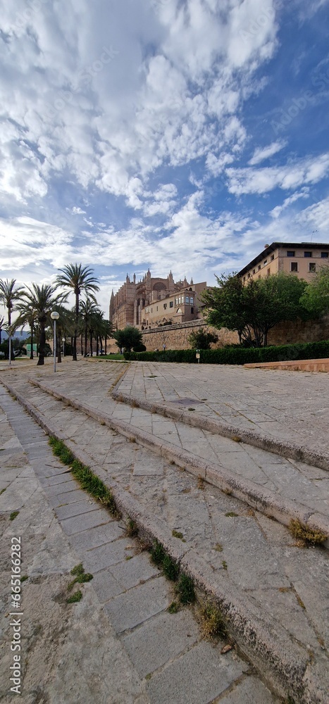 timeless beauty of Mallorca Cathedral, also known as La Seu, with this stunning photograph. The magnificent Gothic architecture of this iconic religious landmark, combined with its stunning location o timeless beauty of Mallorca Cathedral, also known as La Seu, with this stunning photograph. The magnificent Gothic architecture of this iconic religious landmark, combined with its stunning location o