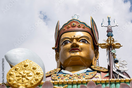 Dakshinkali, Nepal: details of the high statue of Guru Rinpoche (Padmasambhava, Born from a Lotus), tantric Buddhist Vajra master, built in 2012, overlooking Dollu and Pharping monasteries photo