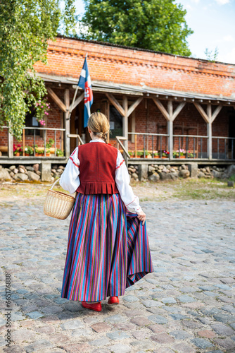 Latvian woman in traditional folk dress