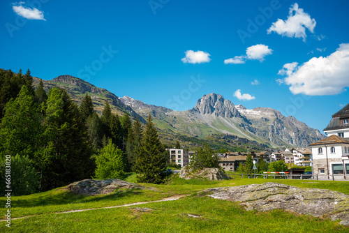 Quaint alpine Swiss town traditional mountain scenery river