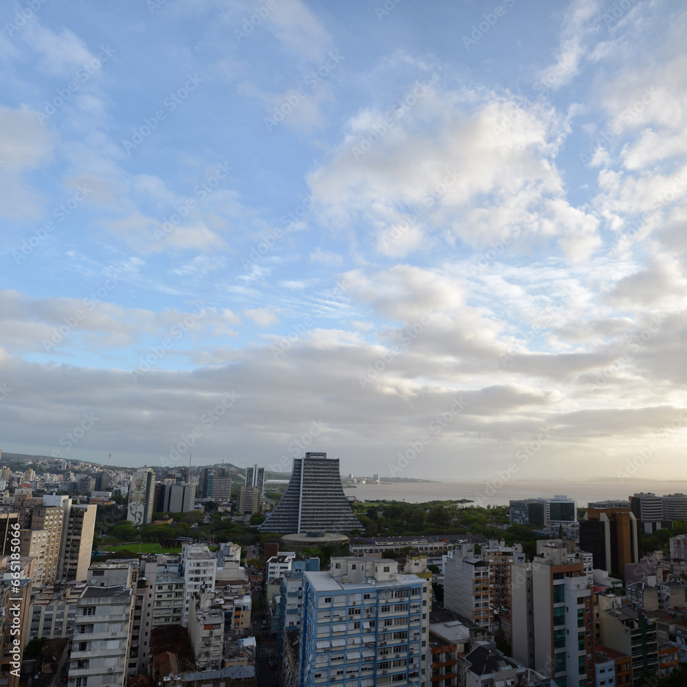 Aerial view of the central area of Porto Alegre with the Guaiba River in the background - sunset with clouds