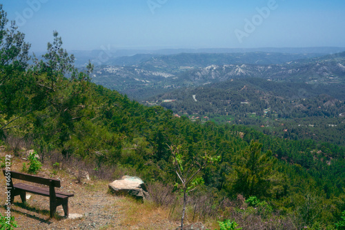 Bench opposite the cliff nature, horizon view