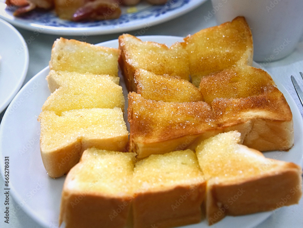 close up toast with butter and sugar close up toast with butter and sugar
