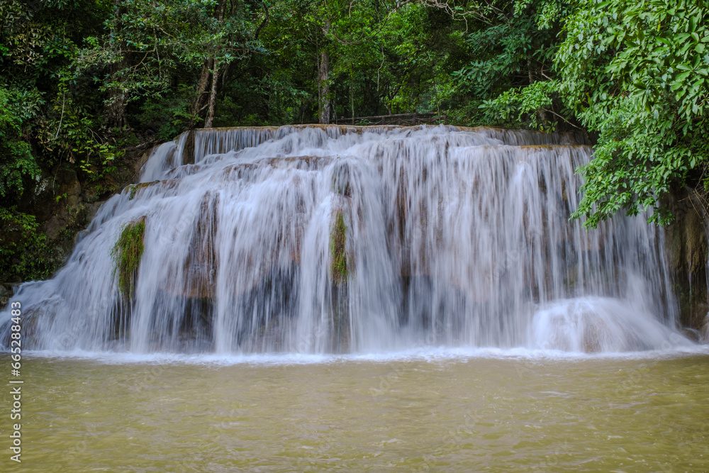 Erawan Waterfall Thailand during rain season, a beautiful deep forest waterfall in Thailand. Erawan Waterfall in National Park Erawan Waterfall Thailand during rain season, a beautiful deep forest waterfall in Thailand. Erawan Waterfall in National Park