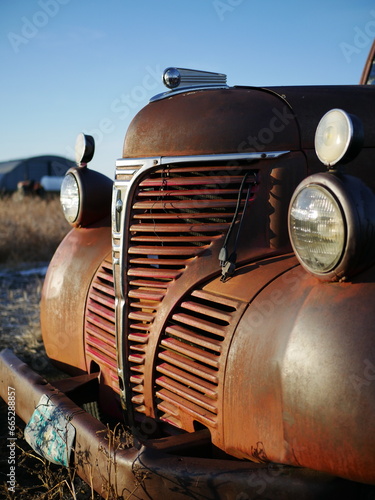 An old rusty abandoned car.