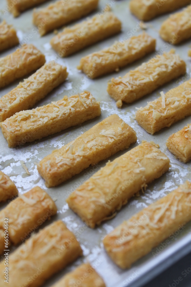 Rows of Indonesian cakes called kastangel on a table ready to serve Rows of Indonesian cakes called kastangel on a table ready to serve