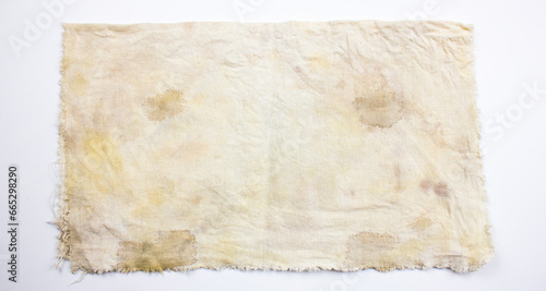 Dirty rag. Stained fabric, the surface of the fabric is stained. Fabric, matter stained with stains.