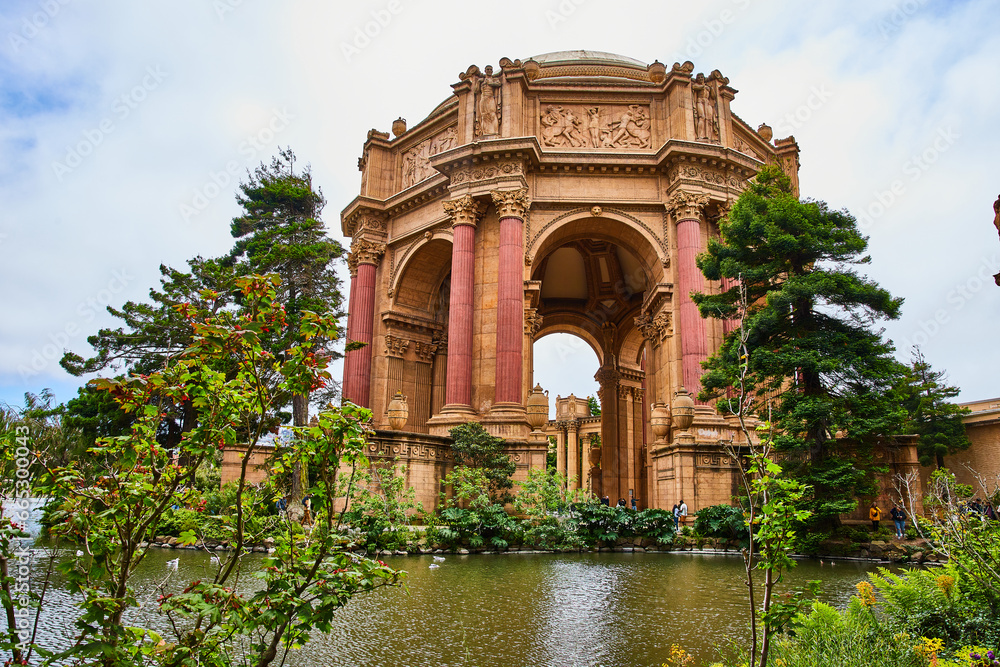 Plants and lagoon in front of Ancient Roman architecture ruin replica at Palace of Fine Arts