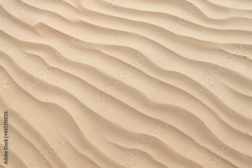 Closeup of sand pattern of a beach in the summer.