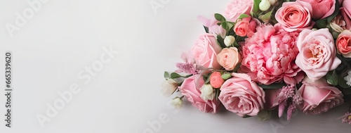 Fresh bunch of pink peonies and roses with copy space. © Khalada
