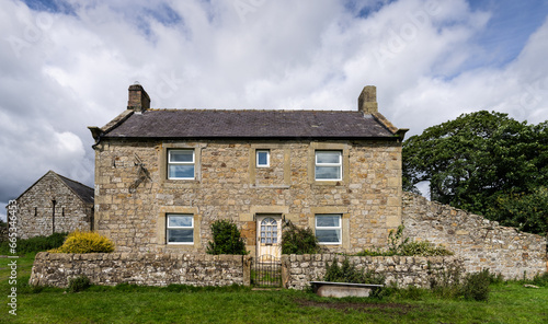 an old stone farmhouse along Hadrian's Wall Path near Once Brewed, Northumberland, UK