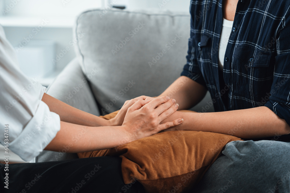 Close up shot of supportive and comforting hands for cheering up depressed person or stressed mind with utmost empathy