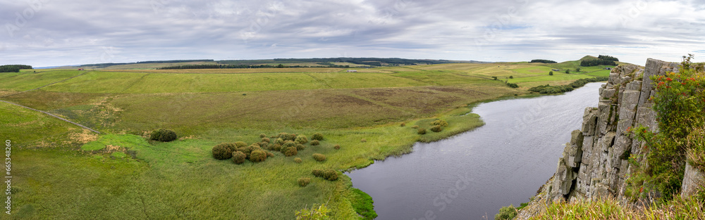 panoramic view looking across to Highshield Crags and Crag Lough near Housesteads, Northumberland, UK
